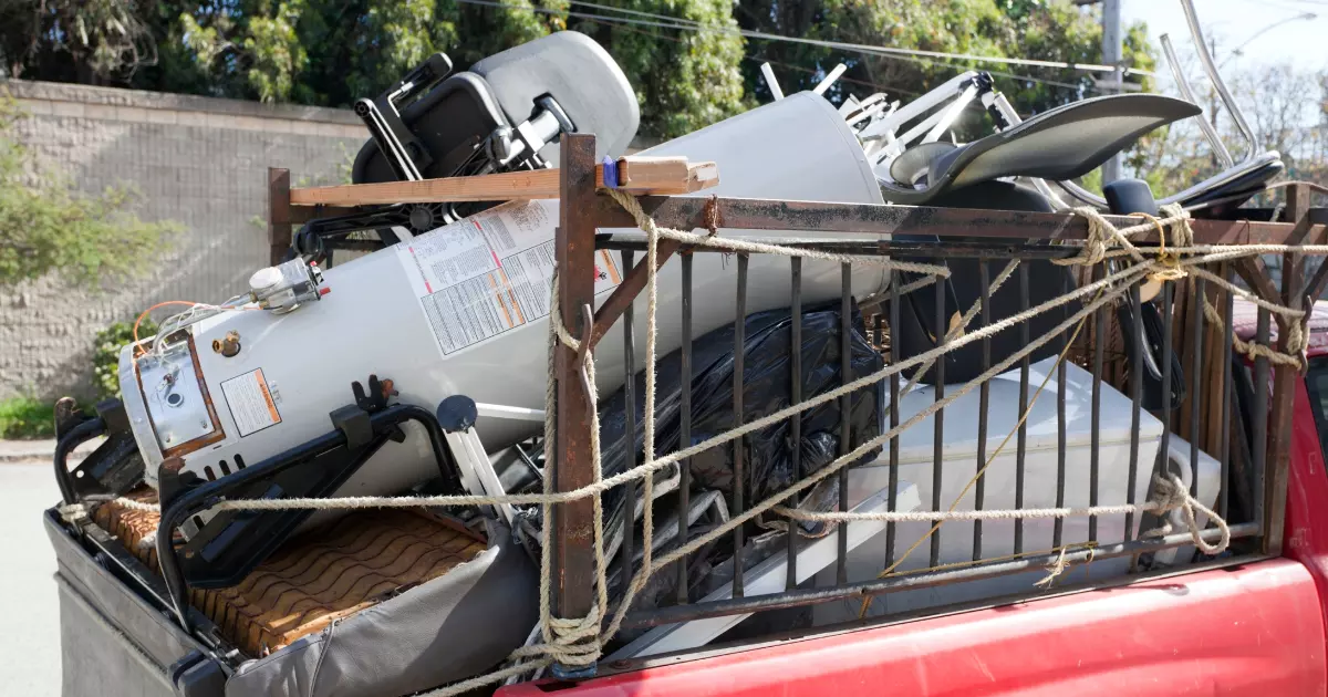Truck loaded with old appliances for junk hauling